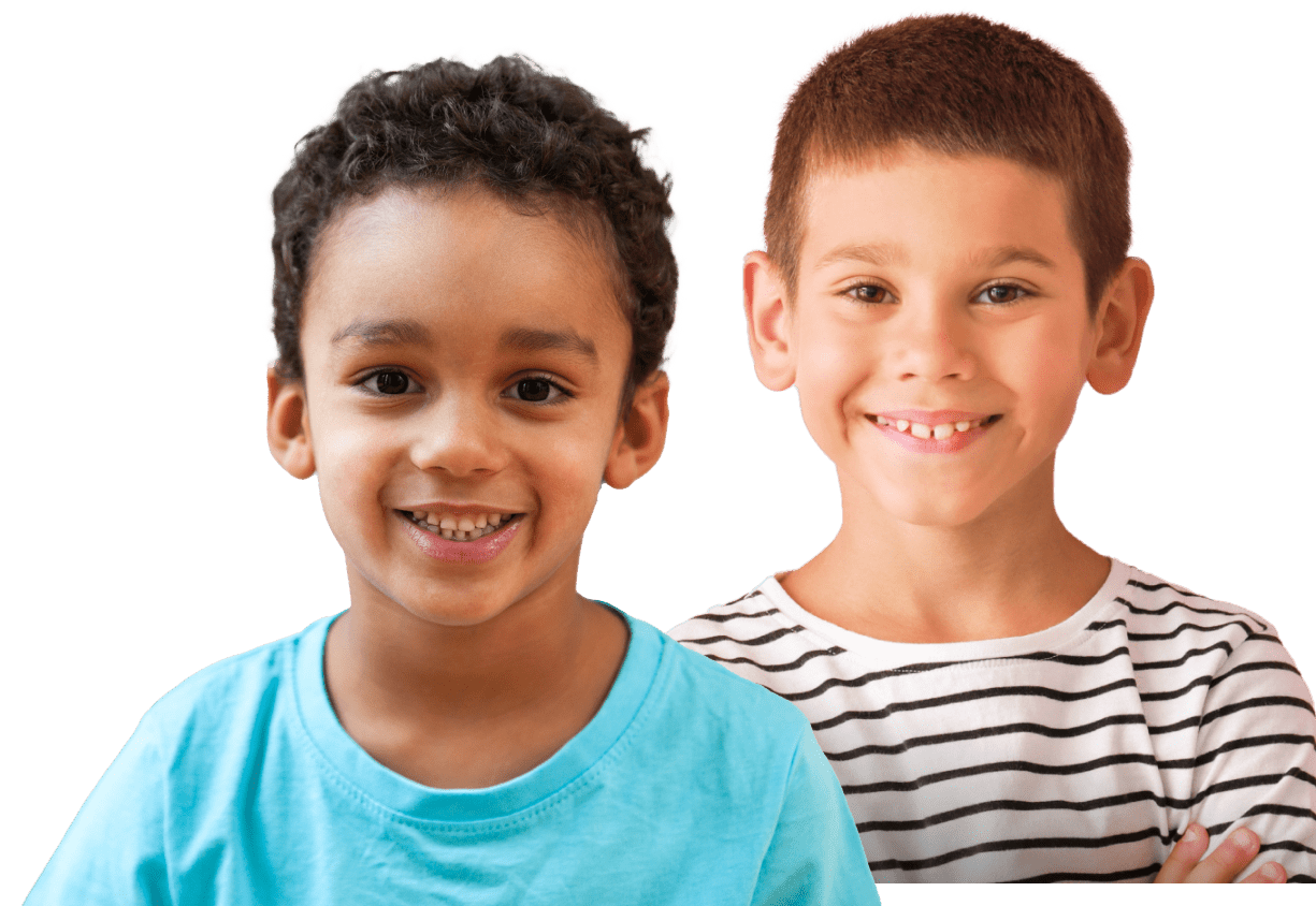 two young boys are smiling for the camera